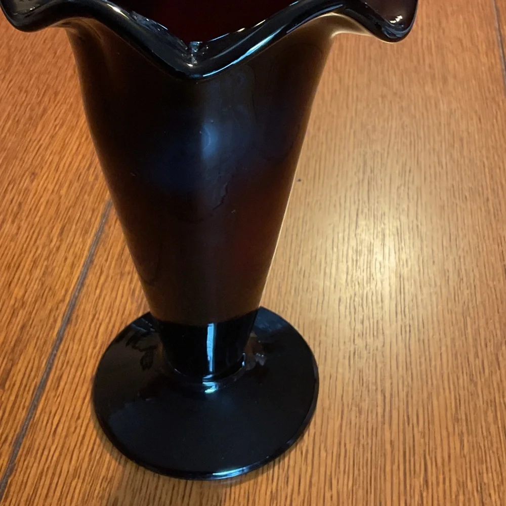 Elegant dark purple vase.